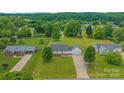 Expansive single-story home features a sprawling yard and a two-car attached garage at 195 Antler Dr, Statesville, NC 28625