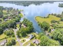 A beautiful aerial view of a waterfront property with lush greenery and serene blue waters at 3005 Vernell Ln, Shelby, NC 28150