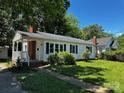 Charming single-story home with a well-maintained lawn and inviting front porch at 1119 Sanders St, Rock Hill, SC 29732