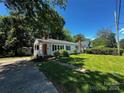 Charming single-story home with a well-maintained lawn and inviting front porch at 1119 Sanders St, Rock Hill, SC 29732