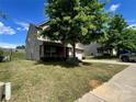 Side view of a two-story home with a front porch and a well-kept lawn at 11505 Sweetbriar Ridge Dr, Charlotte, NC 28269
