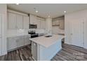Contemporary kitchen with sleek countertops, stainless steel appliances, and a center island at 1420 Wildflower St, Newton, NC 28658