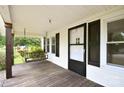 Relaxing porch with a swing, ideal for enjoying the outdoors in comfort at 2306 W C St, Kannapolis, NC 28081