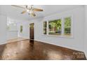 Bright living room with hardwood floors, neutral decor, and ample natural light at 370 Old Camden Rd, Lancaster, SC 29720