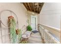 Inviting outdoor space with potted plants, cozy seating, and natural lighting at 104 Pier 33 Dr # 311, Mooresville, NC 28117