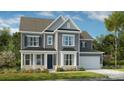 Charming two-story home with gray siding, black shutters, and a well-manicured front lawn at 1102 Sugar Creek Rd, Indian Land, SC 29707