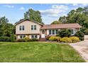 Charming two-story home with brick accents and a well-manicured lawn, perfect curb appeal at 206 Cedarwood Dr, Salisbury, NC 28147