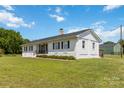 Side view of a well-maintained single-story home featuring a green lawn at 4855 Saluda Rd, Rock Hill, SC 29730