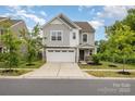 Attractive two-story home with a two-car garage, easy driveway access and lovely curb appeal at 1313 Forkhorn Dr, Monroe, NC 28110
