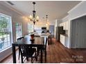 Spacious kitchen with island, stainless appliances, and adjacent dining area at 2330 Winthorp Ridge Rd, Charlotte, NC 28270
