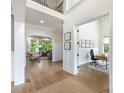 Bright foyer with hardwood floors, opens to a living room, an office and staircase at 1445 Cherry Laurel Dr, Waxhaw, NC 28173
