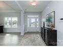 Elegant entryway featuring light gray walls, a decorative rug, and stylish furnishings at 1463 Mocksville Hwy # 24, Statesville, NC 28625
