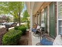 Inviting front porch with comfortable seating and charming decor at 19143 Juanita Ln, Cornelius, NC 28031