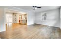 Open-concept room with hardwood floors, recessed lights, ceiling fan and lots of space at 3120 Parkway Ave, Charlotte, NC 28208