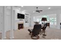 Inviting living room with fireplace, built-ins, and comfortable seating at 4028 Garden Oak Dr, Indian Trail, NC 28079