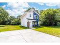 Contemporary two-story home featuring a sleek design, modern color scheme, and well-maintained lawn at 413 Jose St, Shelby, NC 28150