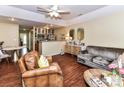 Comfortable living room with an open floor plan to the kitchen and dining area at 517 N Graham St # 3E, Charlotte, NC 28202