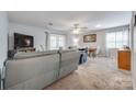Spacious living room offering plush seating, natural light, and an adjacent dining area for entertaining at 679 Fairforest Rd, Chester, SC 29706