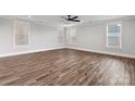 Bright, airy living room with wood floors, lots of natural light, and neutral paint at 1852 Yardley St, Rock Hill, SC 29732