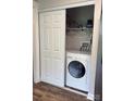 Convenient closet with washer and dryer hookups, featuring sliding doors for easy access at 247 E Cabarrus Ave, Concord, NC 28025