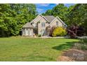 Charming home with a large front yard and vibrant landscaping at 3610 Providence Mill Rd, Maiden, NC 28650