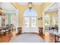 Welcoming foyer boasts wood floors, an arched entryway, and plenty of natural light at 458 Inverness Pl, Rock Hill, SC 29730
