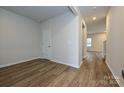 Spacious living room features hardwood floors, neutral paint colors, and natural light at 2206 Silverbell Ln, Stanley, NC 28164