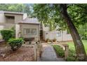 Inviting townhome with well-maintained landscaping creates a warm curb appeal and blends with the surroundings at 222 Riverview Ter, Clover, SC 29710