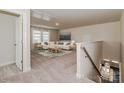 Upstairs Gathering room with neutral carpet, large windows, and comfortable seating, perfect for relaxing at 425 Bent Burr Crk, York, SC 29745