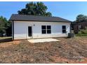 Exterior features include a freshly sodded backyard with an ample concrete patio and new construction at 601 Queens Rd, Gastonia, NC 28052