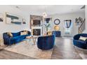 Inviting living room with a fireplace, comfortable seating, and elegant decor at 6381 Trinity Crossing Cir, Kannapolis, NC 28081