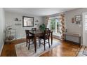 Inviting dining room with hardwood floors, neutral colors, and natural light at 1014 Vandalia Dr, Charlotte, NC 28212