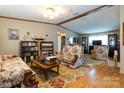 Inviting living room featuring classic furnishings, wood trim, and ample space for entertaining or relaxation at 404 St Lukes Church Rd, Kings Mountain, NC 28086
