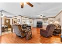 Inviting living room with hardwood floors, neutral tones, and comfortable seating arrangement at 4600 Beatties Ford Rd, Charlotte, NC 28216