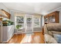 Bright entryway featuring wood floors, neutral walls, and windows that illuminate the space with natural light at 125 Maple St, New London, NC 28127