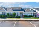 Inviting home with neat landscaping, set back from parking, and decorated with an American flag at 2153 Pavilion Ct, Rock Hill, SC 29732