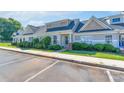 Well-kept single-story home with attractive landscaping and a paved walkway at 2153 Pavilion Ct, Rock Hill, SC 29732