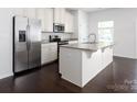 Kitchen with stainless steel appliances and granite countertop island at 2448 Mariners Cove Ln, Denver, NC 28037