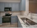 Stylish kitchen features sleek countertops, modern appliances, and ample cabinet space at 4938 Sunset Ridge Ct, Charlotte, NC 28269