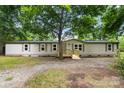 Charming single-story home with light siding and a welcoming wooden porch at 925 Crestland Dr, Clover, SC 29710