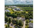 An aerial view of the home showcases its location with mature trees and proximity to main highway at 286 Liverpool Rd, Rock Hill, SC 29730