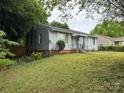Well-maintained home featuring classic architectural details, clean lines and a grassy front yard at 1101 Mona Dr, Charlotte, NC 28206