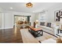 Bright living room with hardwood floors, modern furniture, and an open floor plan at 1425 Downs Ave, Charlotte, NC 28205