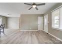 Spacious open living room with updated floors and neutral wall colors at 1690 Montevista Dr, Shelby, NC 28150