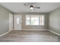 Open living room featuring new floors, ample natural light, and neutral paint at 1690 Montevista Dr, Shelby, NC 28150