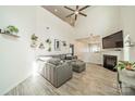 Bright and airy living room with vaulted ceilings, modern decor, fireplace, and abundant natural light at 509 Silers Bald Dr, Fort Mill, SC 29715