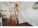 Elegant foyer with hardwood floors and staircase, leading to a bright and open living space at 6314 Bluffton Ln, Midland, NC 28107