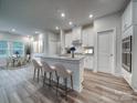 Bright open kitchen with granite countertops and modern appliances at 407 Bent Burr Crk, York, SC 29745