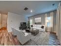 Cozy living room featuring modern decor and plenty of natural light at 407 Bent Burr Crk, York, SC 29745