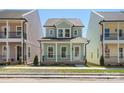 Charming two-story home with a welcoming front porch and beautiful curb appeal at 5820 Pittmon Ln, Kannapolis, NC 28081